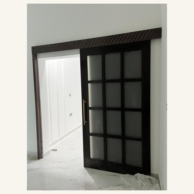 Craft Masters project: Black Sliding Door With Glass Panels
