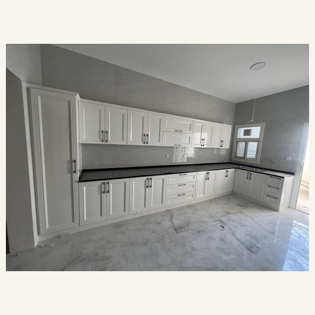 Craft Masters project: White Kitchen Cabinets Black Countertop