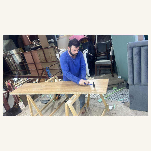 Craft Masters project: Carpenter Working On Wooden Frame